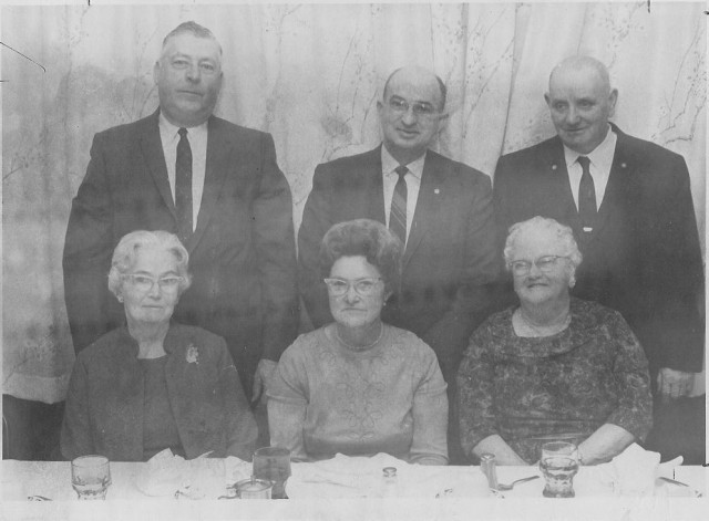 From the Archives:  Firemen's/Ladies Night.  Westerly Sun Photo from 2/5/68.  Caption Reads: The Dunn's Corners Fire Department held its annual dinner and ladies' night program at the Narragansett Inn, Watch Hill, Saturday night with 173 members, guests, and their ladies in attendance.  It was the largest turnout for the affair in the fire company's history.  In the photo, left to right, are Bradford Fire Chief Walter Currie, Westerly Town Council President and president of the Dunn's Corners company Henry M. Morris and Dunn's Corners Fire Chief Edwin M. Greene.  Seated, left to right, are Mrs. Currie, Mrs. Morris, and Mrs. Greene.  